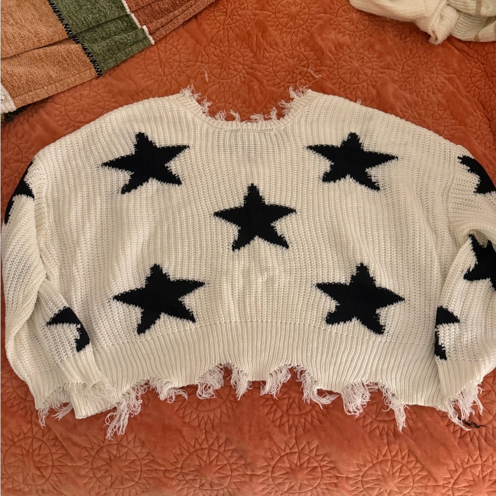 Distressed Oversized White Sweater with Black Stars - Picture 3 of 3